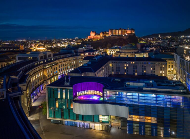 The hotel and Festival Square at night with the castle lit above, Sheraton Grand Hotel & Spa, Edinburgh