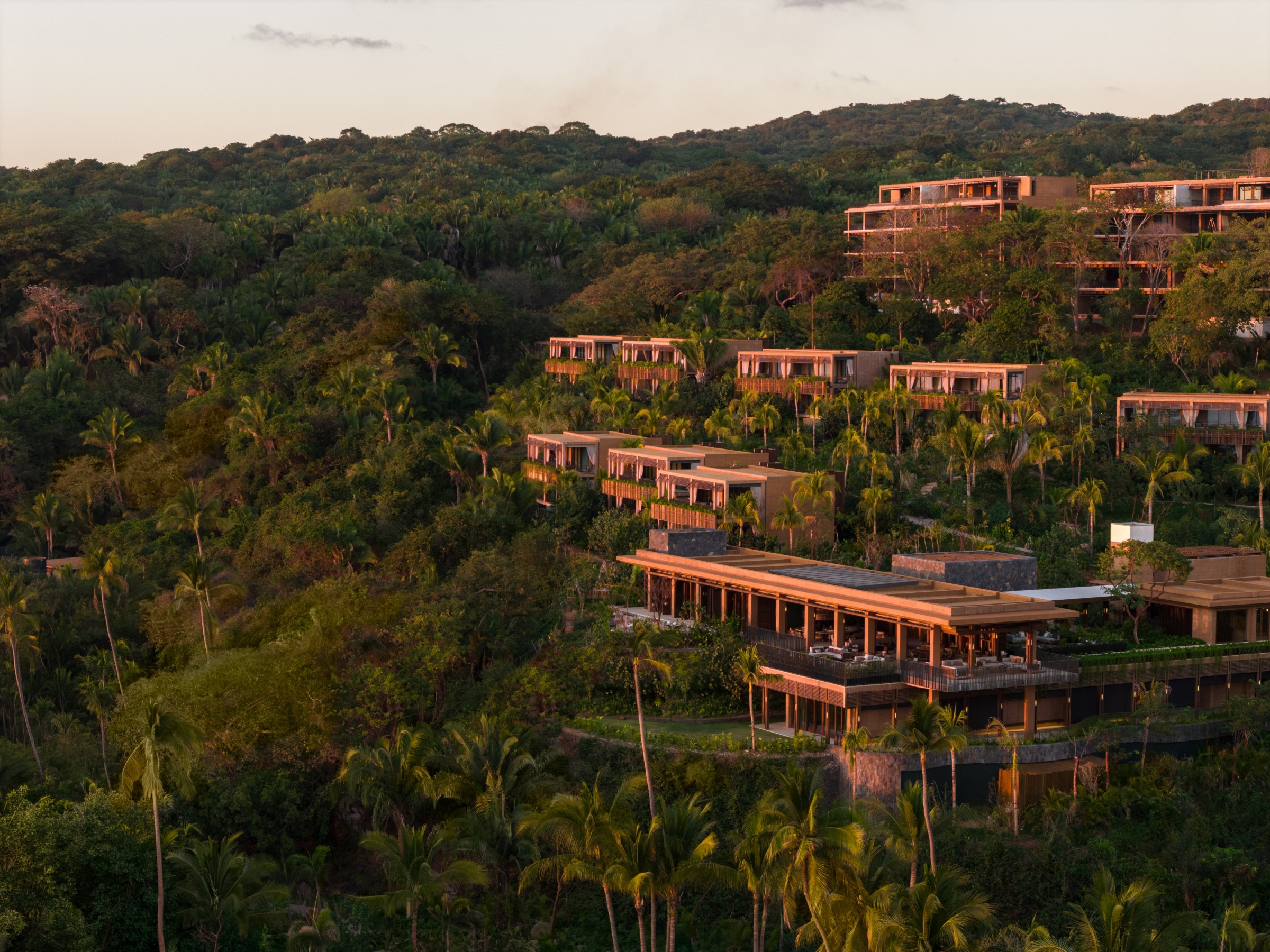 Resort buildings on the forested hillside, Siari Riviera Nayarit, a Ritz-Carlton Reserve