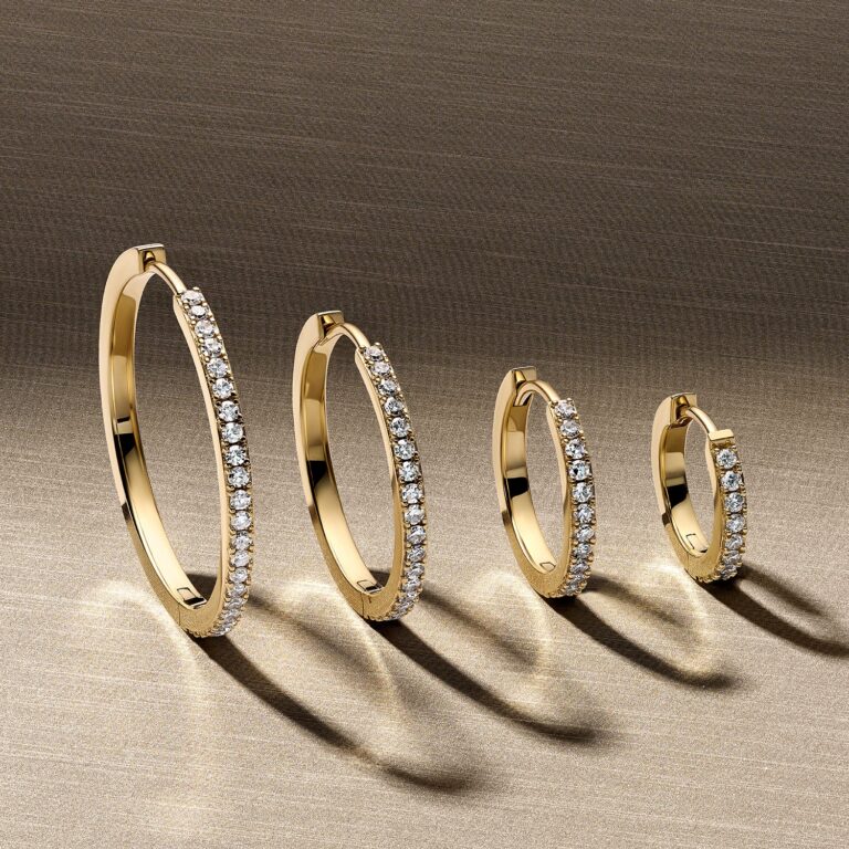 Diamond-set hoop earrings in yellow gold in graduated sizes, Sif Jakobs