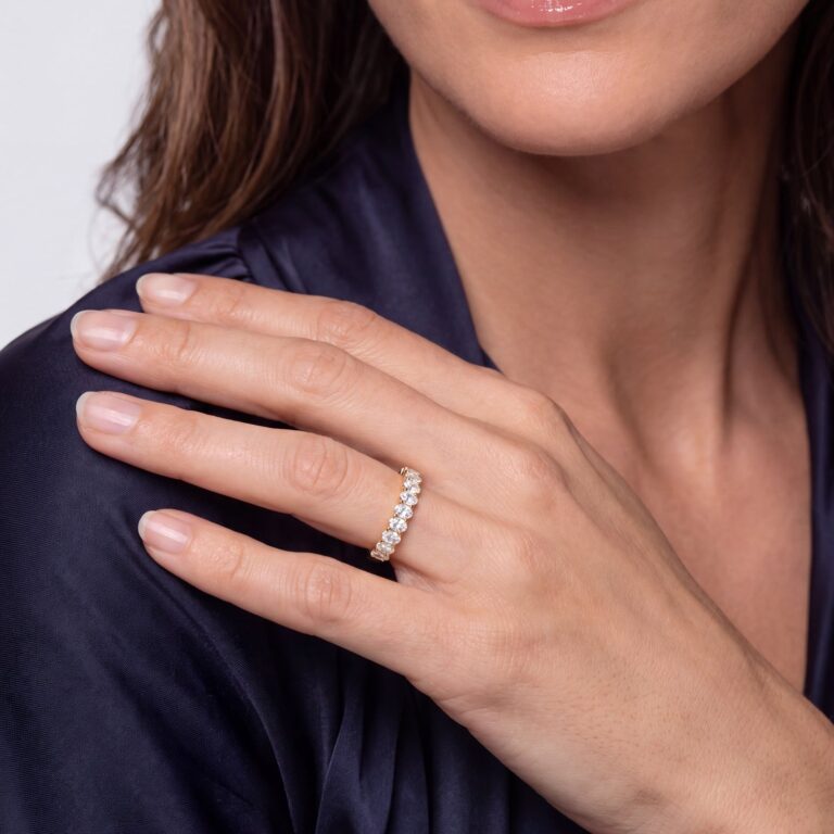 A diamond-set wedding band worn on the hand, Sif Jakobs