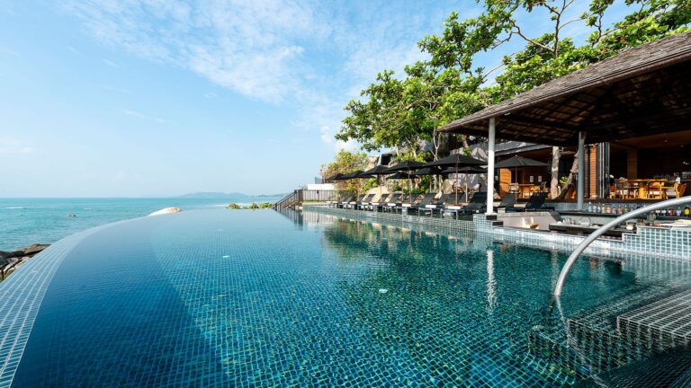 Infinity pool with a covered terrace beside it, looking out over the coast, Silavadee Pool Spa Resort
