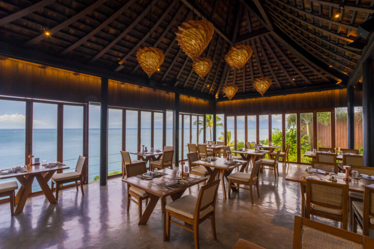 The Height dining room with floor-to-ceiling windows over the sea, Silavadee Pool Spa Resort
