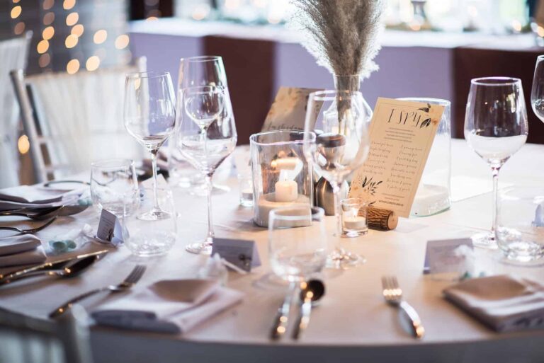 Reception table with glassware, menu card and pampas grass, Silavadee Pool Spa Resort