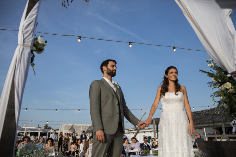 Bride and groom at their beach ceremony in Fregene, at the end of June, Silvia Cleri Photography