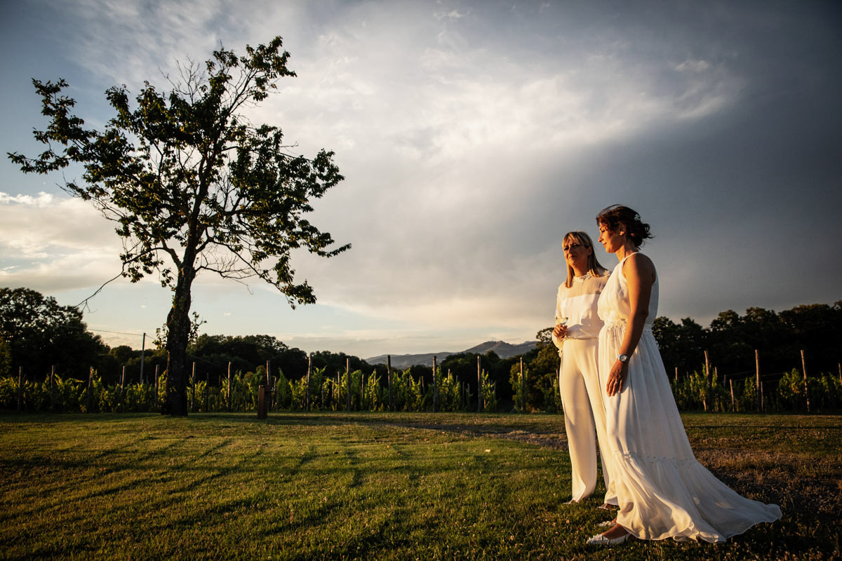 Two brides at sunset among the vineyards of Antonello Colonna Resort, Labico, Silvia Cleri Photography