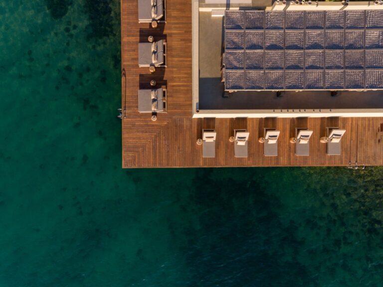 Wooden pier with loungers over the water, Six Senses Kaplankaya