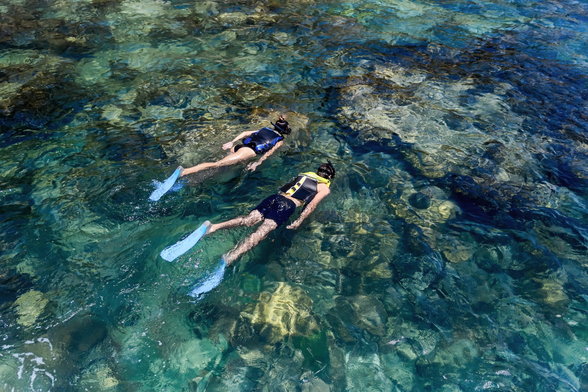 Snorkelling over the reef, Six Senses Krabey Island