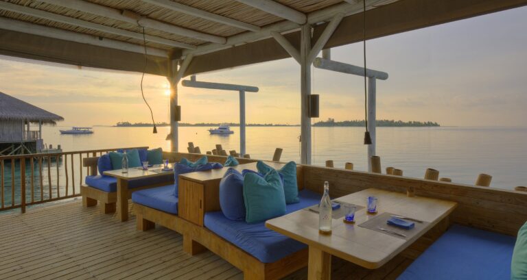 Chill Bar on the water at sunset, Six Senses Laamu