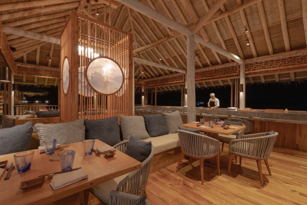 Zen restaurant with chefs preparing dishes, Six Senses Laamu