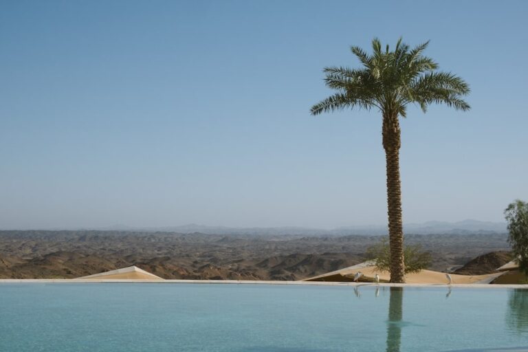 The Main Oasis Pool with Desert and Hijaz Mountain Backdrop, Six Senses Southern Dunes