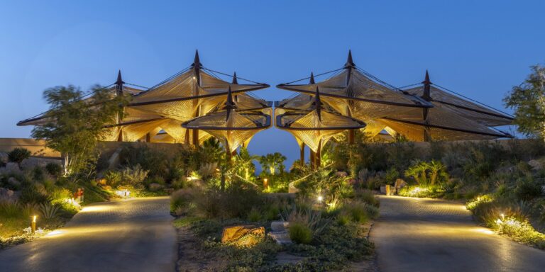 A Shaded Resort Terrace with Desert Views and Mountain Horizon, Six Senses Southern Dunes