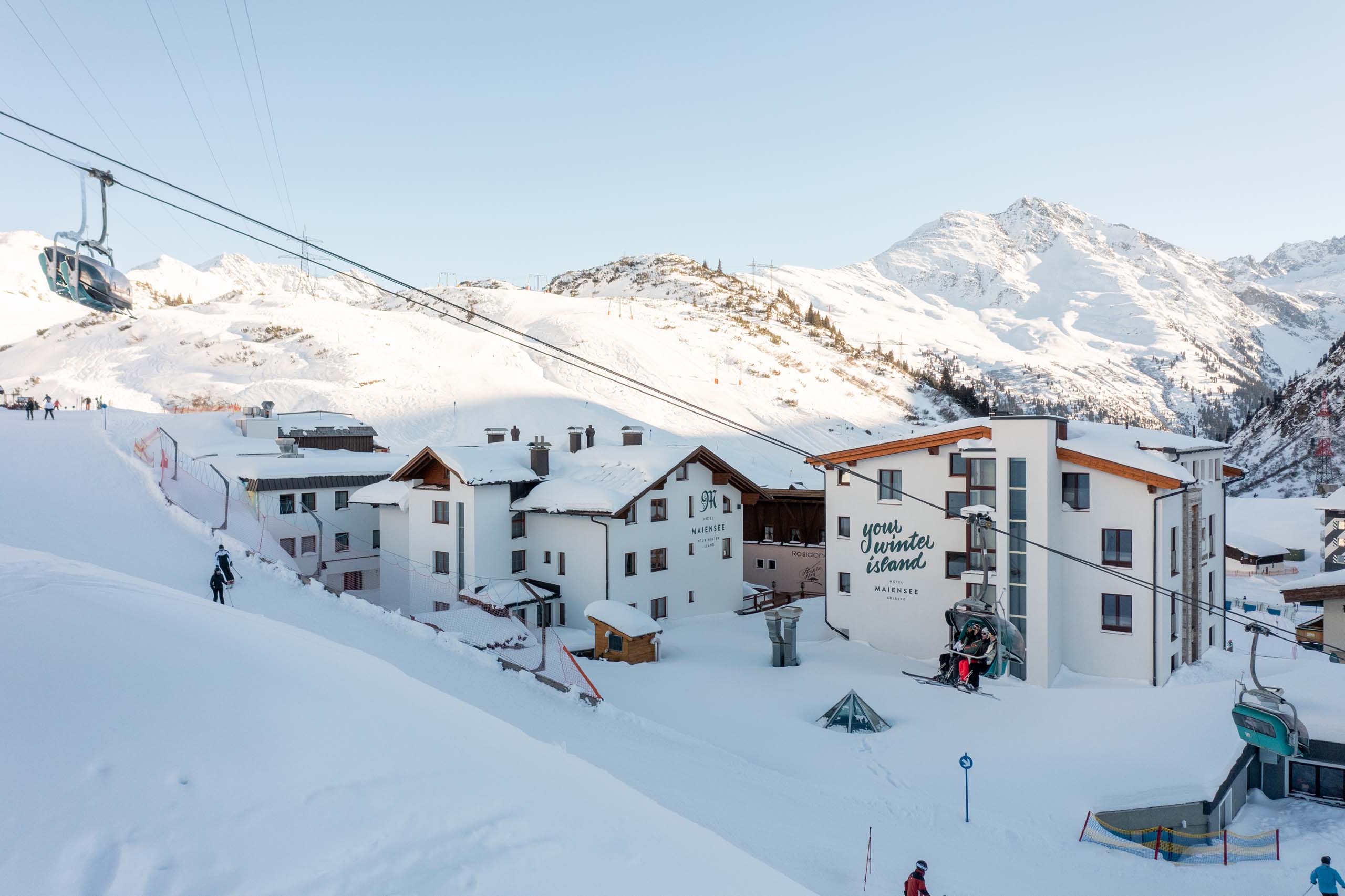 The hotel on the slope in winter, Ski Hotel Maiensee