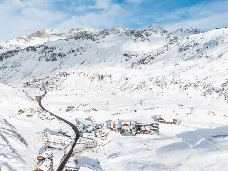 The Arlberg pass road and St. Christoph in snow, Ski Hotel Maiensee
