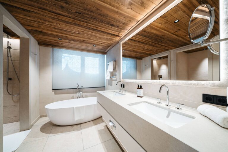 Marble bathroom with freestanding bath, Ski Hotel Maiensee