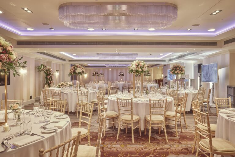 The Westminster Suite laid for a banquet under its crystal chandeliers, Sofitel London St James