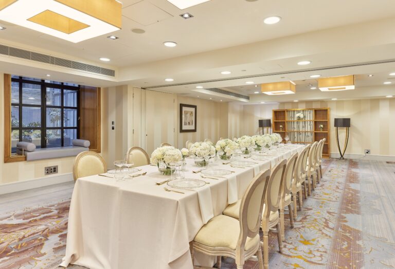 Piccadilly and Bloomsbury set with one long table dressed in white flowers, Sofitel London St James