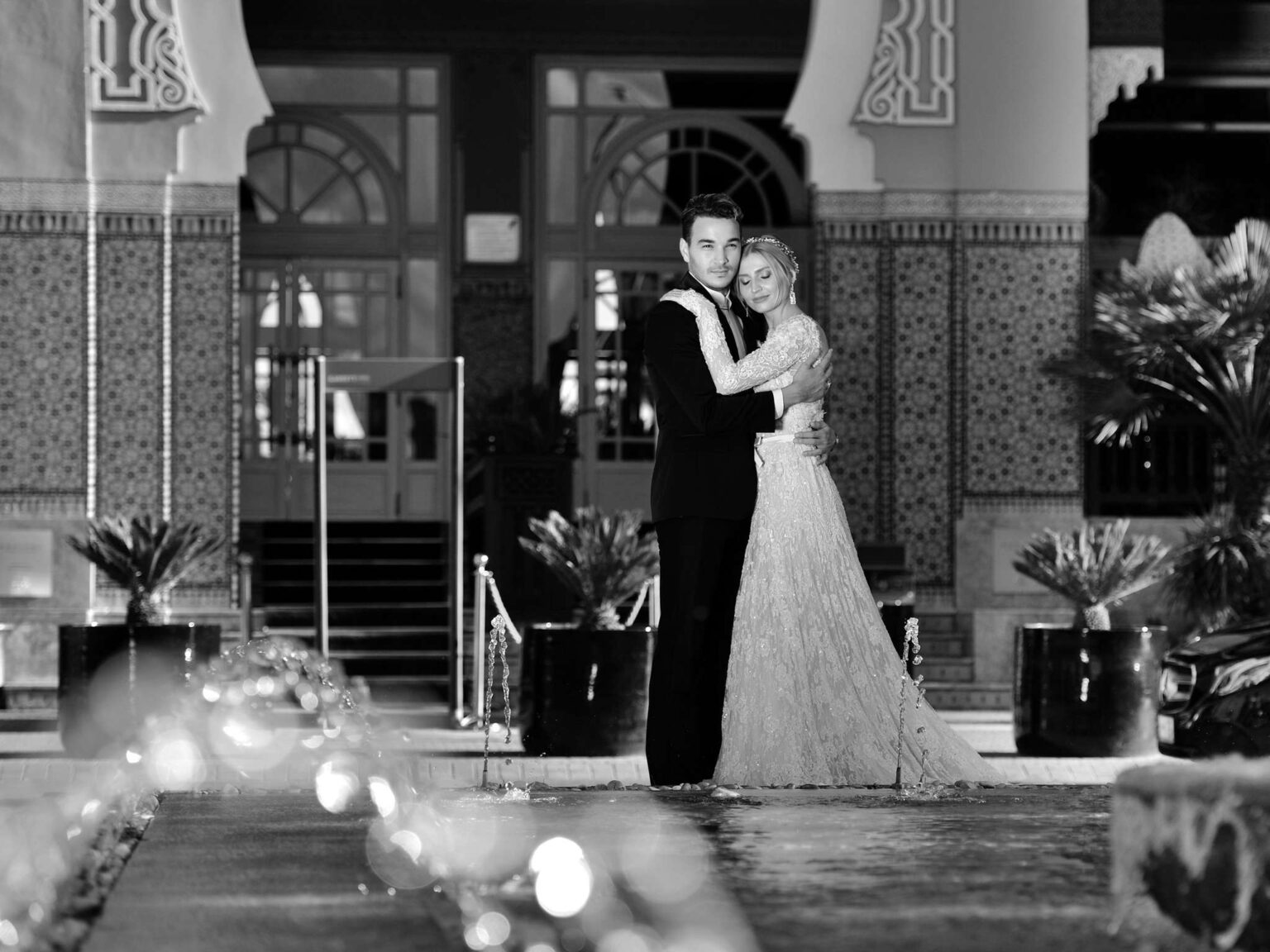 A couple dancing on the hotel steps