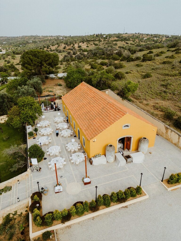 Aerial view of the Barn terrace laid for dinner, Solar do Paço Algarve