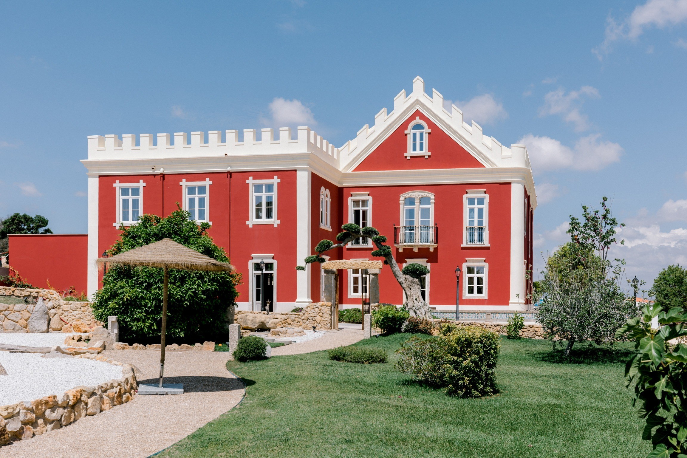 The red Palace with its crenellated parapet, Solar do Paço Algarve