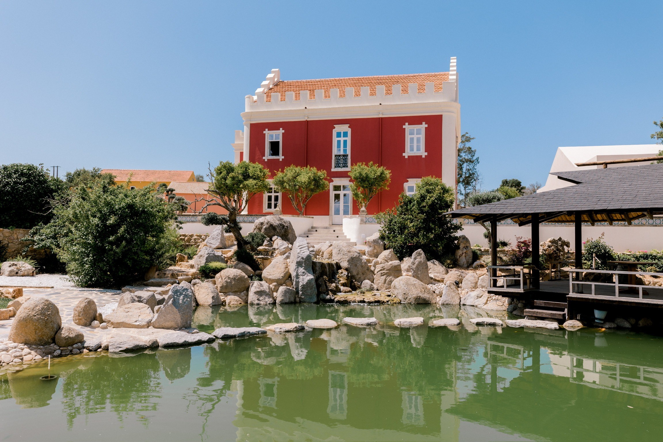 The Japanese garden pond with the Palace beyond, Solar do Paço Algarve