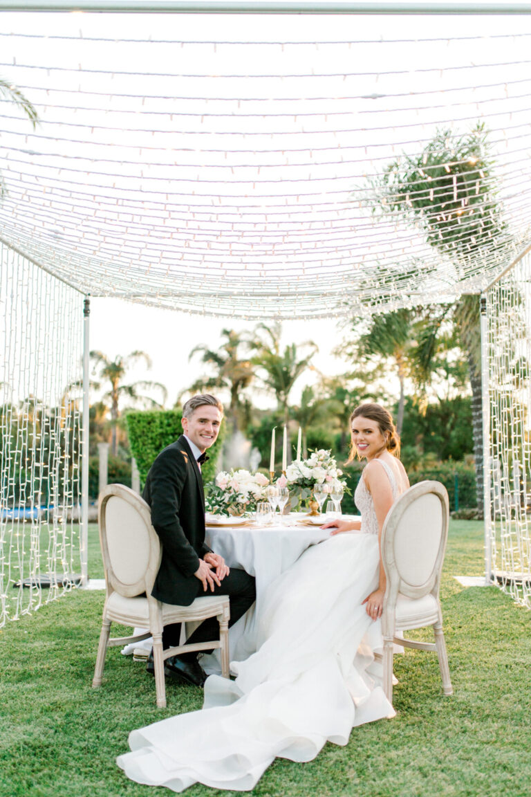 Couple at a private table under a canopy of fairy lights, Sonho a Dois Algarve Wedding Planners