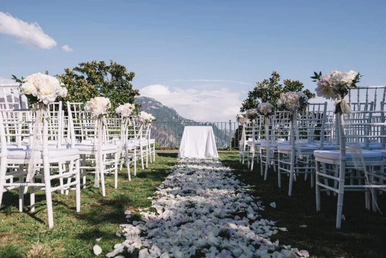 Petal aisle and white flowers for a garden ceremony in Ravello, Sophisticated Weddings