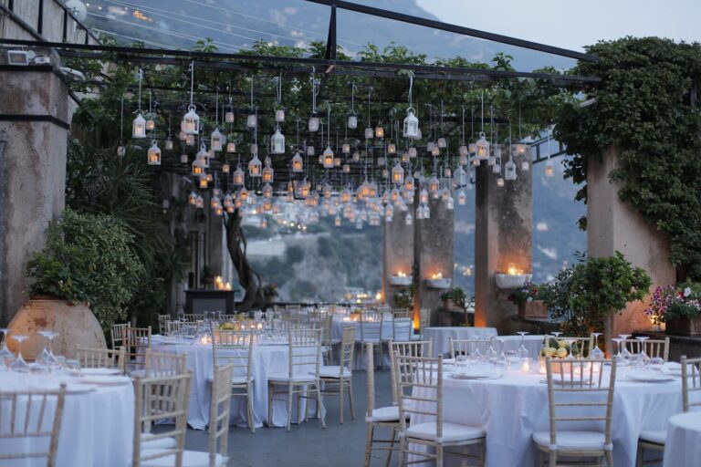 Hanging lanterns over the reception tables at Villa Magia, Positano, Sophisticated Weddings