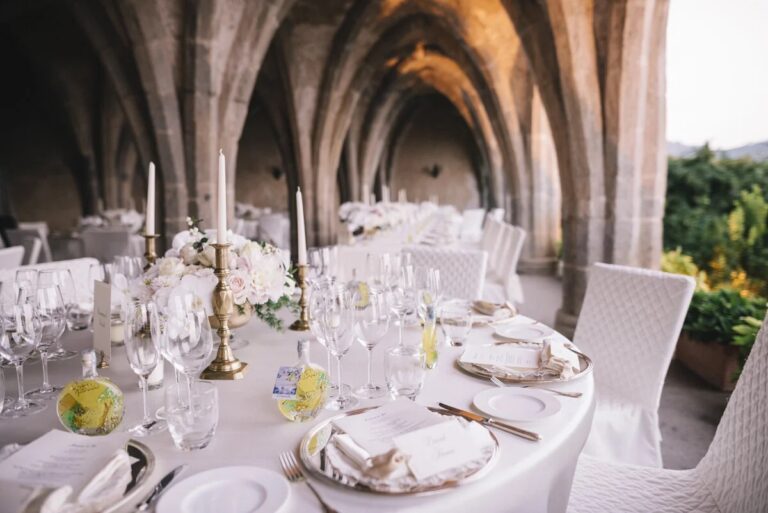 Candlelit table in the vaulted crypt at Villa Cimbrone, Ravello, Sophisticated Weddings