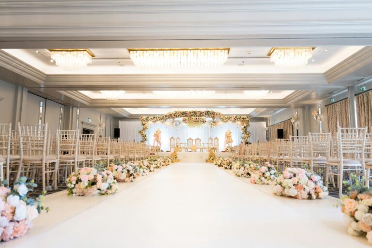 A long aisle lined with flowers in the function suite, Sopwell House