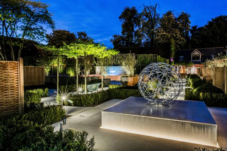 A garden courtyard with a water feature at dusk, Sopwell House