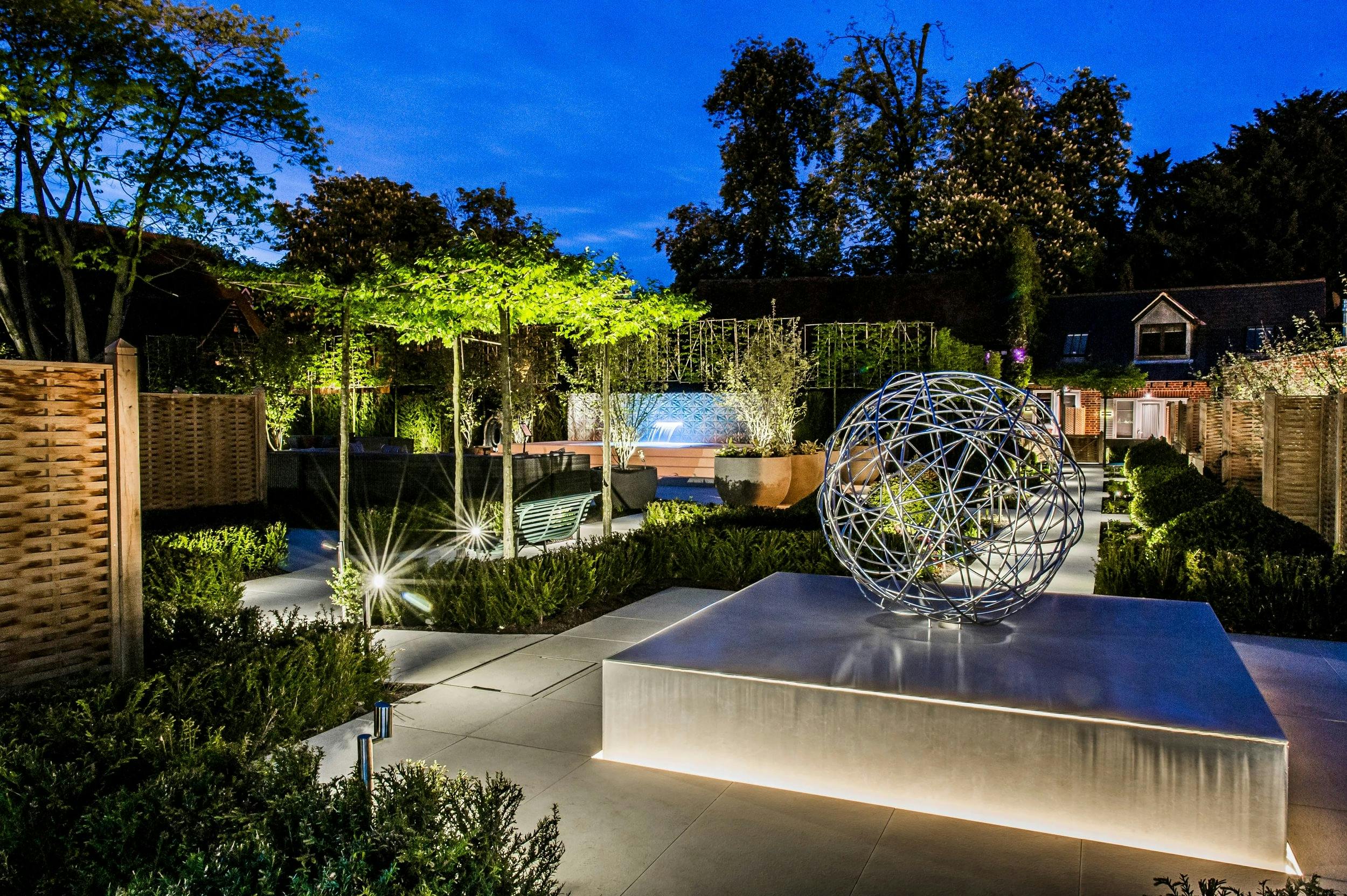 A garden courtyard with a water feature at dusk, Sopwell House