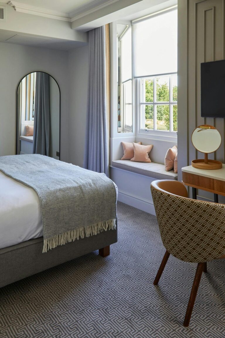 A bedroom with a window seat, Sopwell House