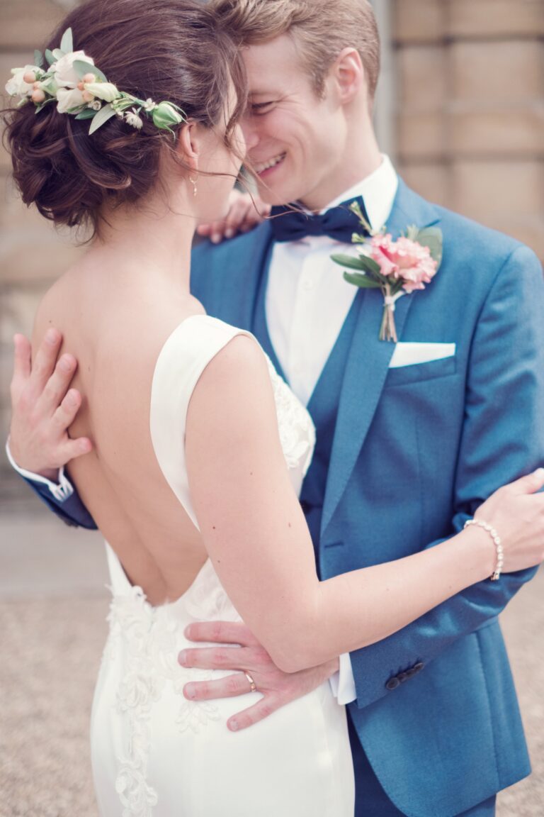 A close embrace at dusk, the skyline soft behind them, Sorcha Herbert Flowers
