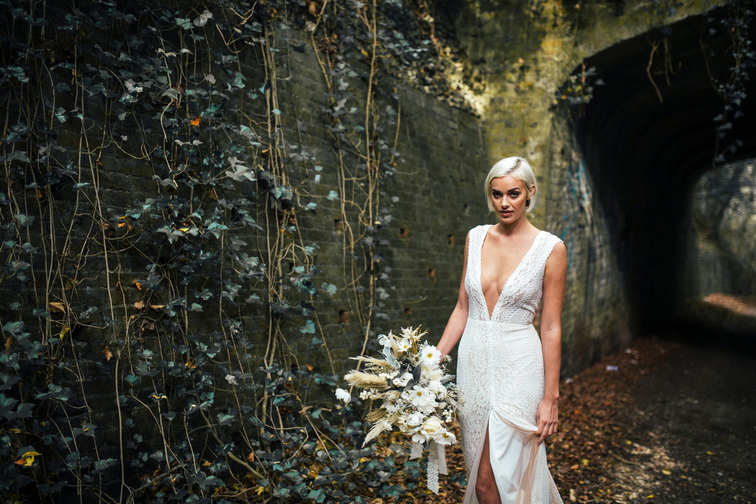 Bridal portrait, an ivy-covered tunnel, Sorcha Herbert Flowers