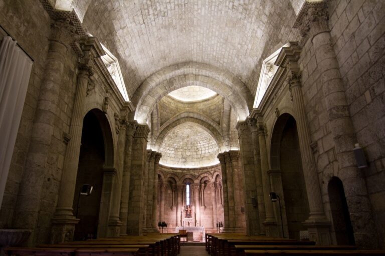 A candlelit church interior, Spain4weddings