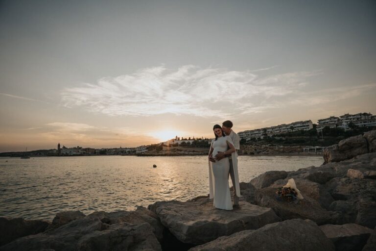 A couple at sunset on the rocks, Spain4weddings