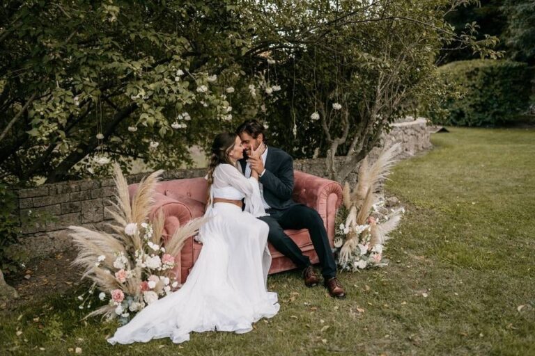 A couple in pampas grass, Spain4weddings
