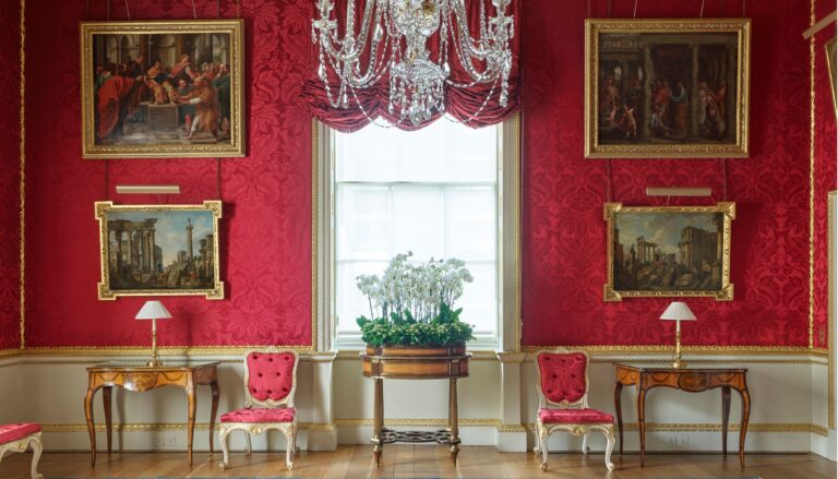 The north wall of Lady Spencer's Room, panelled in crimson damask and gilt, Spencer House