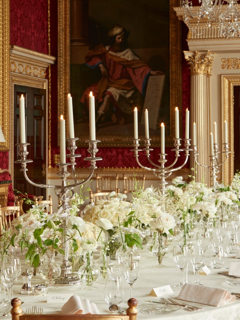A white floral display by Flowerbx, set among the gilded State Rooms, Spencer House