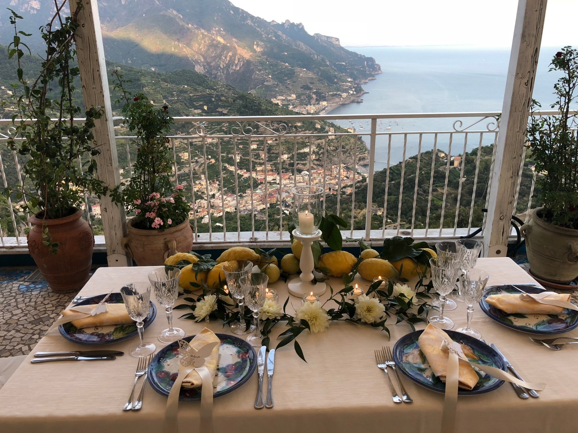 A table for four on a terrace, lemons and yellow dahlias down the centre, Sposa Mediterranea By A&C
