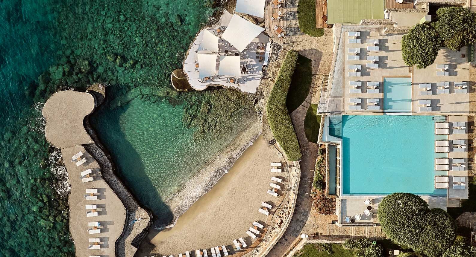 Aerial view of the villas and the cove, St Nicolas Bay Resort Hotel and Villas