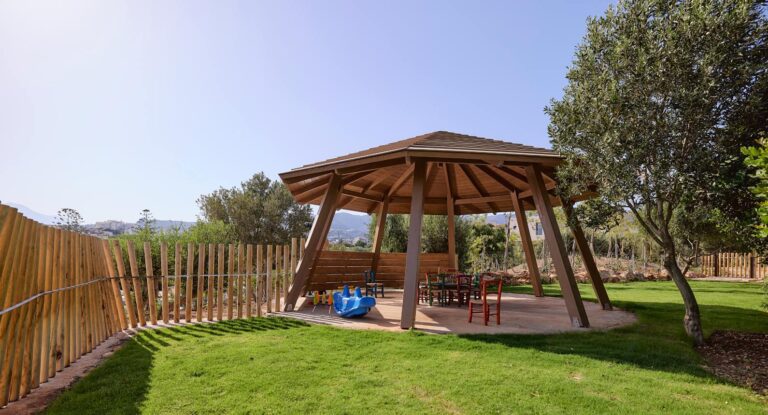 A garden gazebo and lawn, St Nicolas Bay Resort Hotel and Villas