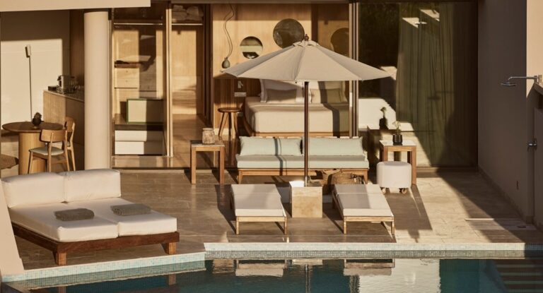 A villa terrace with loungers and a private pool, St Nicolas Bay Resort Hotel and Villas
