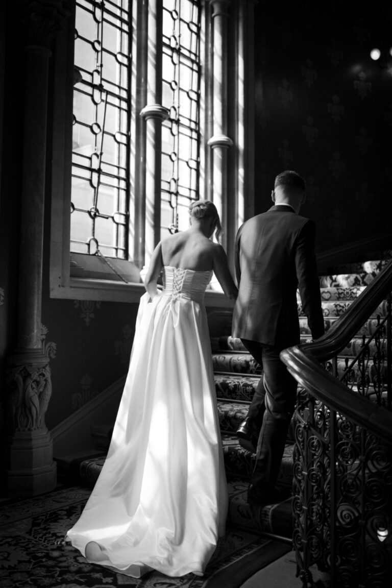 A couple on the hotel staircase, St Pancras Renaissance Hotel London