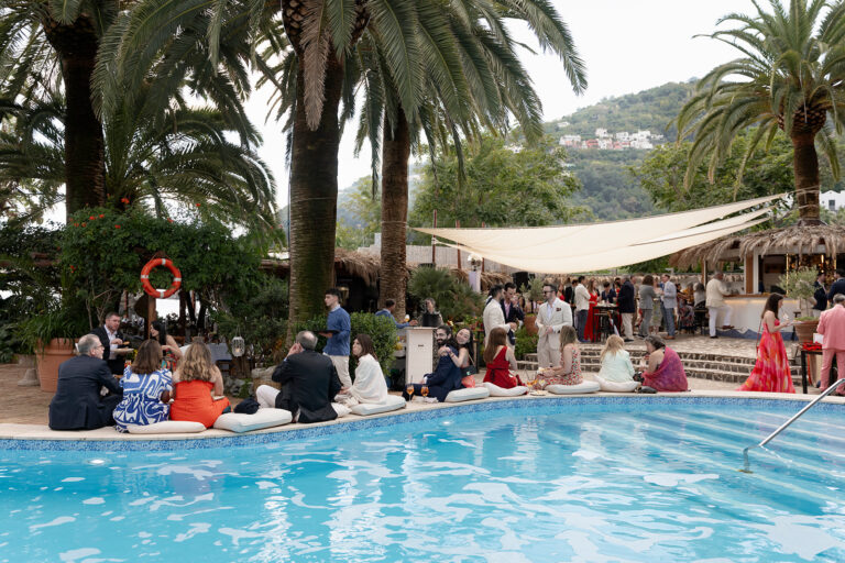 Guests around the sea pool at Giardino Eden during Emily and Eliot's reception, Ischia, Stefania Silvestro