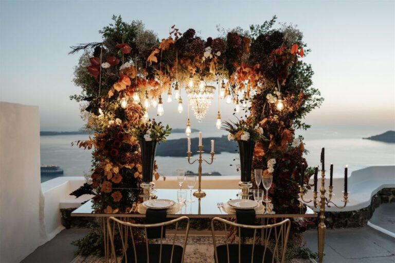 A top table under an autumn floral canopy and candlelight, Stella and Moscha