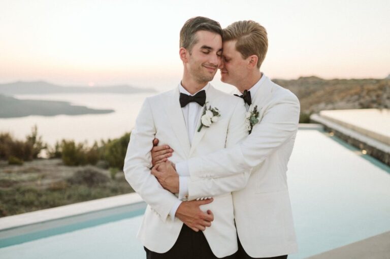 Grooms in white dinner jackets, the Aegean behind, Stella and Moscha