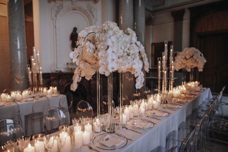 Candlelit banquet table with floral centrepiece, Stella Rheni