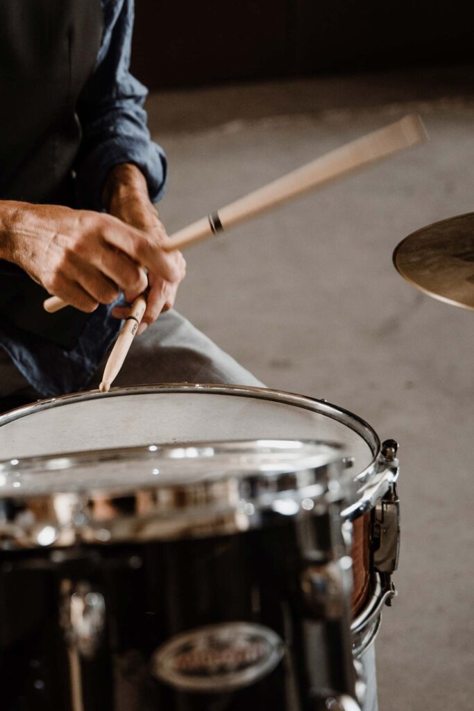 Drumsticks and a snare drum close up, Stereo Star Band