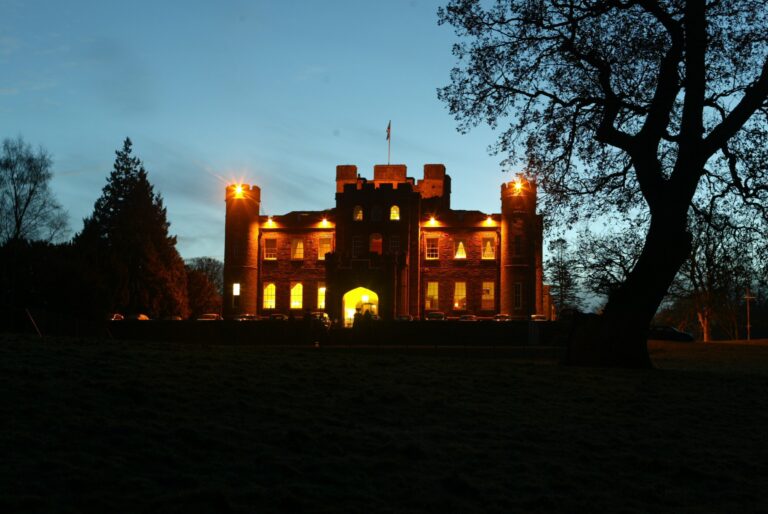 Stobo Castle lit at dusk
